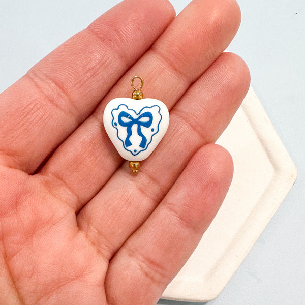 CHARM BAR Premium 18k Gold Plated and Stainless Steel CERAMIC BEAD Charms-----> Heart with Bow